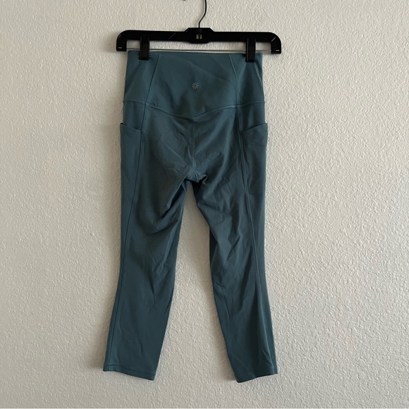 Athleta Salutation Stash Pocket II Capri Leggings In Blue Green Size XS - Picture 4 of 7